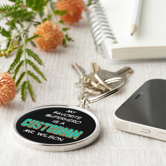 superheld-beheerder sleutelhanger (Zijkant)