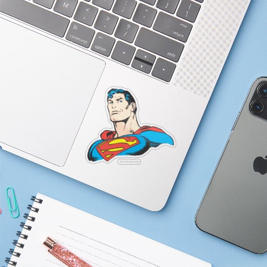 Superman Bust Smirk Sticker (Laptop met iPhone)