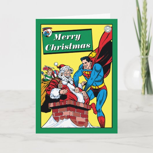 Superman die de kerstman in de schoorsteen helpt feestdagen kaart (Voorkant)
