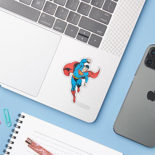 Superman links vuist opgetild sticker (Laptop met iPhone)