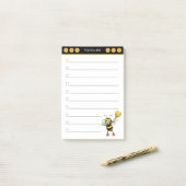 Supershoningbijen op zwarte en witte briefjes post-it® notes (Op bureau)