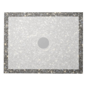 Superzwaar zwart gat in het midden van een sterren notitieblok