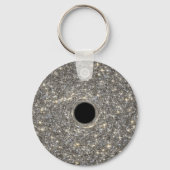 Superzwaar zwart gat in het midden van een sterren sleutelhanger (Achterkant)