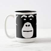 Surf Munkey logo over een mok (Links)