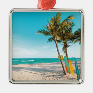 Surf planken op strandwerend kussen metalen ornament