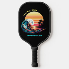 Surfen op zonsondergang pickleball paddle