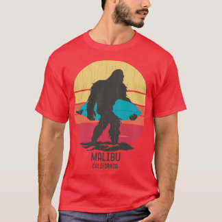 Surfende Bigfoot Malibu Californië T-shirt