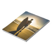 Surfer-silhouet tijdens zonsopgang notitieblok (Linkerzijde)