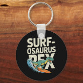 Surfosaurus Rex Grappige Surfende Dinosaurus Sleutelhanger (Voorkant)