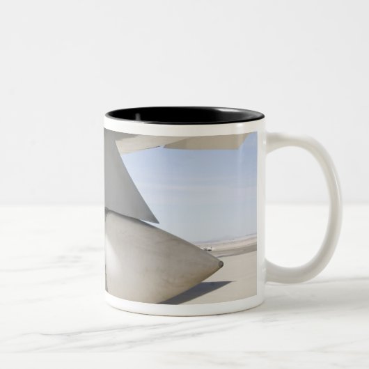 Surpluszee Phoenix-raketten Tweekleurige Koffiemok (Rechts)