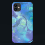Surreal Fractal Abstract Design iPhone 11 Hoesje<br><div class="desc">Een koel etherisch energetisch fractal. Veel stuitende cirkels,  bubbels en ziringen in verschillende kleuren van ijzige koele blauwen,  zachte munt en verschillende tinten van paars. Dit surrealistische,  abstracte ontwerp,  dat bestaat uit het draaien van het binnendringen van kleuren creëer een zachte gloeiende mengeling van kleur en motie.</div>