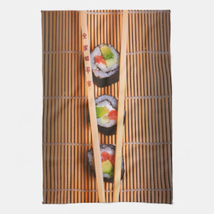 Sushi en houten stokjes theedoek