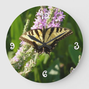 Swallowtail Butterfly op Paarse wilde bloemen Grote Klok