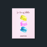 "Sweet Essence of Life gepersonaliseerde Franse Ma Canvas Afdruk<br><div class="desc">Vier de zoetheid van het leven met onze "Sweet Essence of Life" gepersonaliseerde Canvas Print, met een heerlijke waterverf schilderij van Franse macarons (macarons). Dit elegante kunstwerk toont een reeks macarons in zachte gele, roze en blauwe tinten, geplaatst tegen een charmante roze achtergrond, die de schoonheid en eenvoud van het...</div>