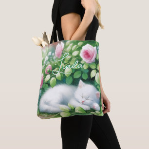Sweet Napping White Kitten onder een Rozen Struik Tote Bag