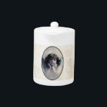 Sweet Rosy Cheeked  Angel in de wolken Theepot<br><div class="desc">Een prachtig  ontwerp van een zoete engel met zachte witte vleugels en roze wangen,  die haar gezicht in haar handen houdt. Een vredig en aardig gezicht. De achtergrond is gevuld met zachte etherwolken.</div>