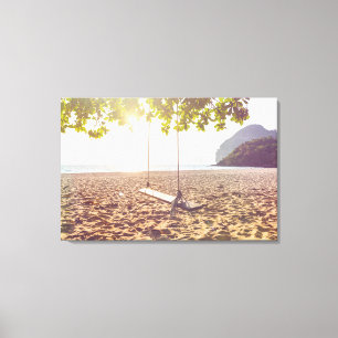 Swing op het strand bij zonsondergang 2 canvas afdruk
