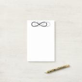 Symbool dubbele infiniteit - zwart en wit post-it® notes (Op bureau)