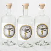 Symbool van de geneeskunde: slangenmetaal goud en  likeurfles etiket (Flessen)