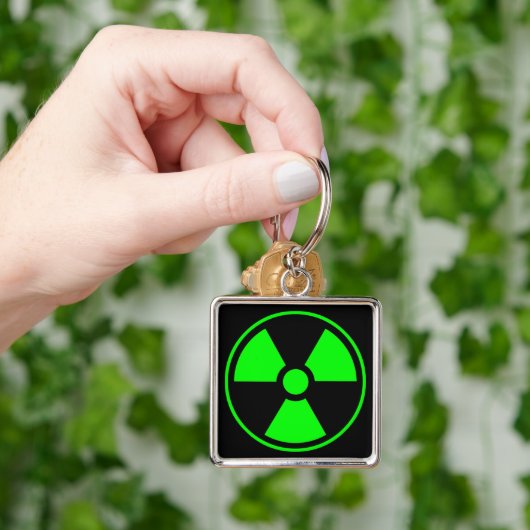 Symbool voor nucleaire radioactieve straling in gr sleutelhanger (Hand)