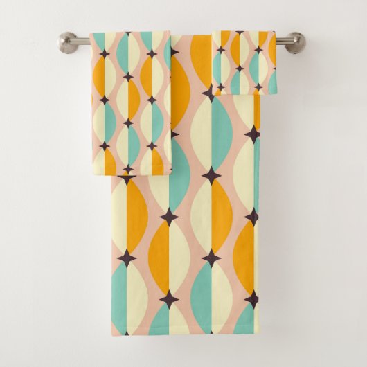 Symmetrical retro pattern with interlocking teal bad handdoek (Insitu)