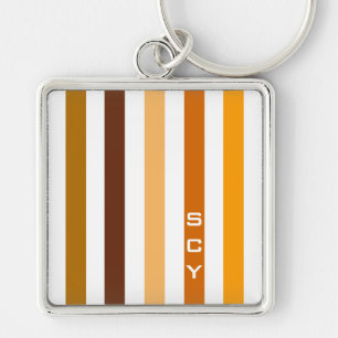 Taan bruin oranje verticale strepen monogram sleutelhanger