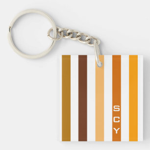 Taan bruin oranje verticale strepen monogram sleutelhanger