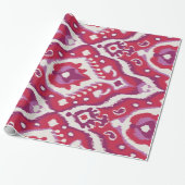 Tabatpatronen met kleurrijke rode en paarse ikat cadeaupapier (Uitgerold)