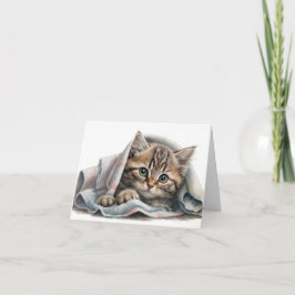 Tabby Kitten onder een pakje Notitiekaartje