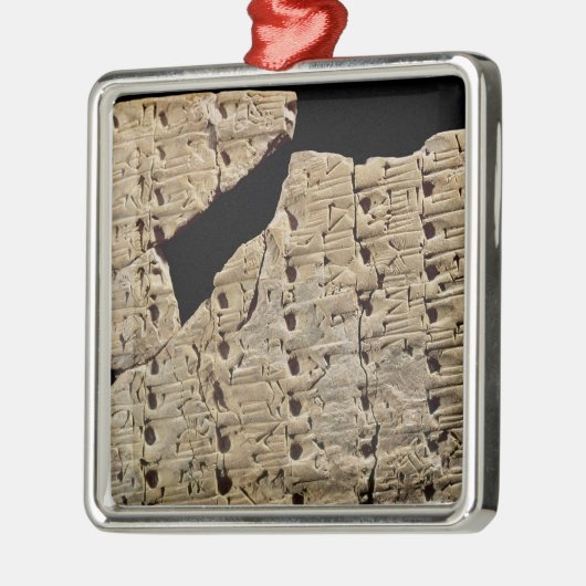 Tablet met cuneiform script, uit Uruk Metalen Ornament (Links)