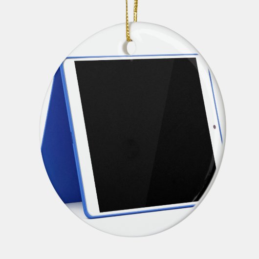 Tabletcomputer op wit keramisch ornament (Links)