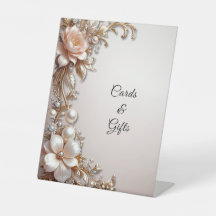 Tafelbordjes met zachte roze en witte bloemen