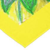 Tafelkleed groen, roze, geel. (Gekanteld)