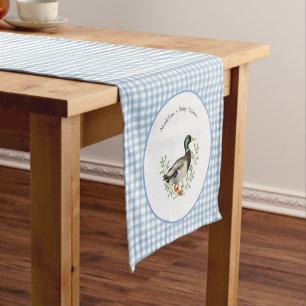 Tafelloper met blauwe gingham afbeelding van een w