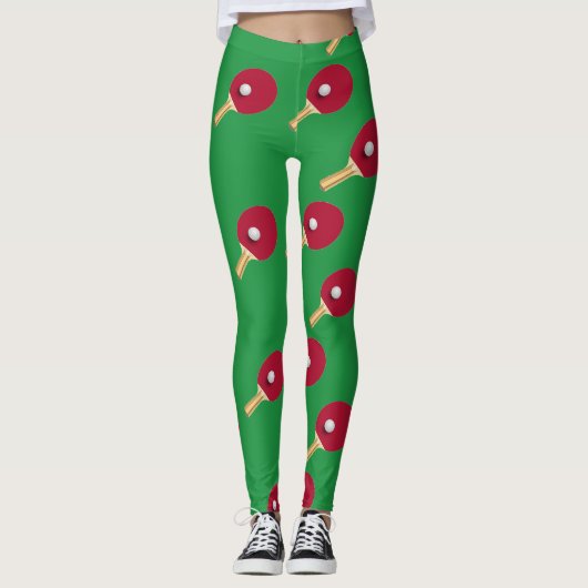 Tafeltennisracket en bal op groen leggings (Voorkant)
