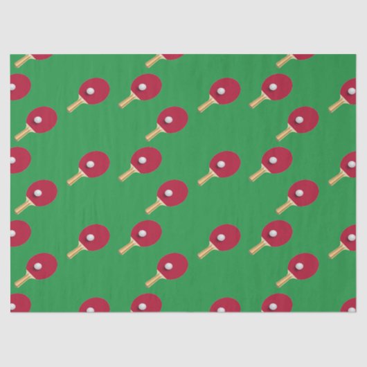 Tafeltennisracket en bal op groen tissuepapier (Voorkant)