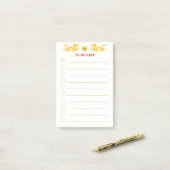 Takenlijst  gouden draken op wit post-it® notes (Op bureau)