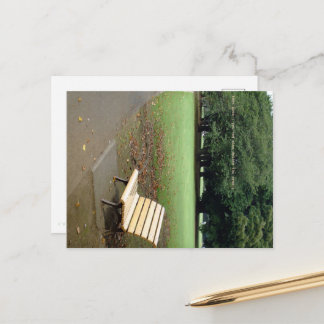 Taking a short break on a park bench. briefkaart