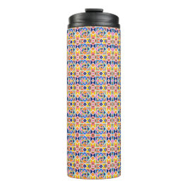 Tall tumbler with a vibrant, geometric pattern thermosbeker