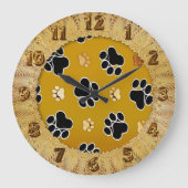 Tan- en zwart-witafdrukken op een gouden achtergro grote klok (Voorkant)