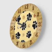 Tan- en zwart-witafdrukken op een gouden achtergro grote klok (Hoek)