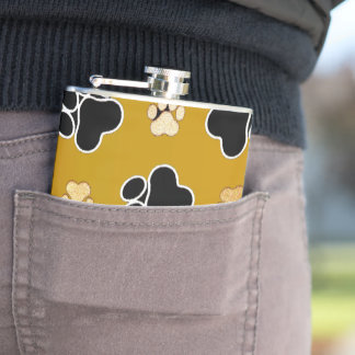 Tan- en zwart-witafdrukken op een gouden achtergro heupfles