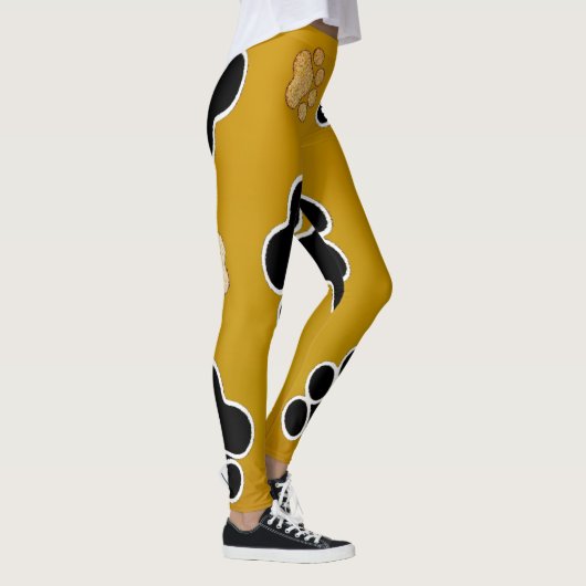 Tan- en zwart-witafdrukken op een gouden achtergro leggings (Rechts)