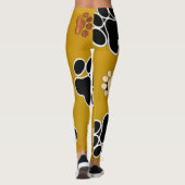 Tan- en zwart-witafdrukken op een gouden achtergro leggings (Achterkant)