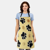 Tan- en zwart-witafdrukken op een gouden achtergro schort (Gedragen)