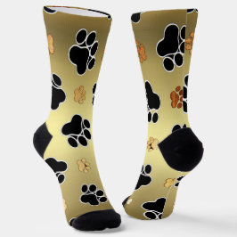 Tan- en zwart-witafdrukken op een gouden achtergro sokken