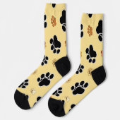 Tan- en zwart-witafdrukken op een gouden achtergro sokken (Links)