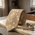 Tan Wildflower Delicate White Blossom & Leaves Stropdas<br><div class="desc">Bring gentle, timeless romance to your wardrobe with this exquisite tan necktie blooming with delicate wildflowers! A graceful scatter of petite white blossoms, soft green leaves, slender stems, and subtle foliage creates a light, airy botanical pattern across a warm, earthy beige-tan background, evoking peaceful meadows and vintage pressed-flower elegance. This...</div>