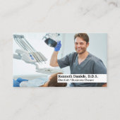 Tandarts die de tanden van patiënten inspecteert visitekaartje (Voorkant)