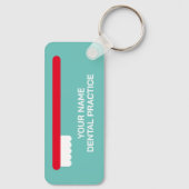 Tandarts kantoor sleutelhanger met rode tandenbors (Achterkant)